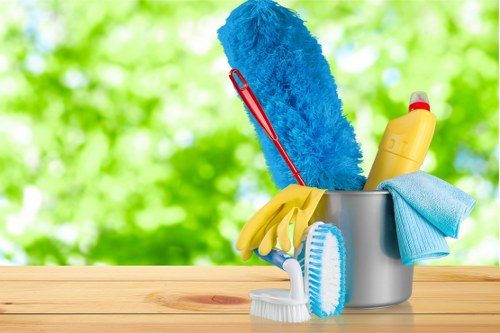Carpet cleaning team preparing equipment safely before a job