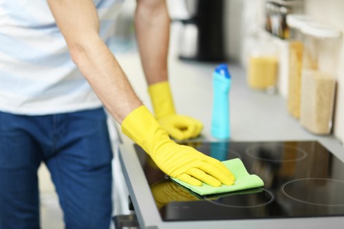 Cleaning operatives reviewing chemical handling and safety checks
